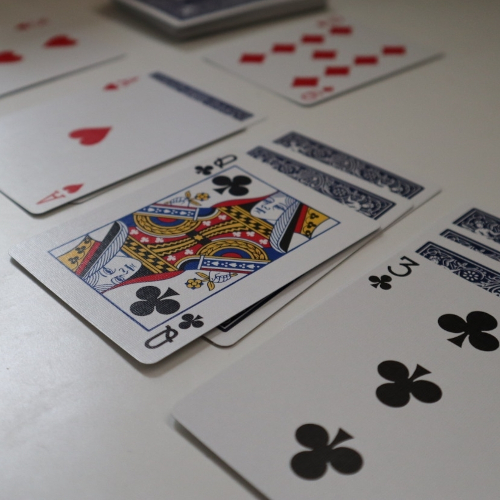An online game of Solitaire that uses sessions to manage and update the player's game state. A web game made in the 90s might have worked something like this.